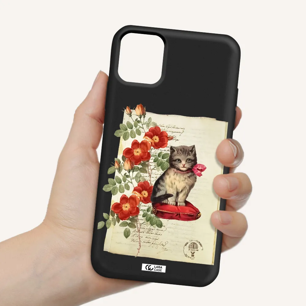 a cat on a pillow with flowers Apple iPhone 11 Silicone black Case