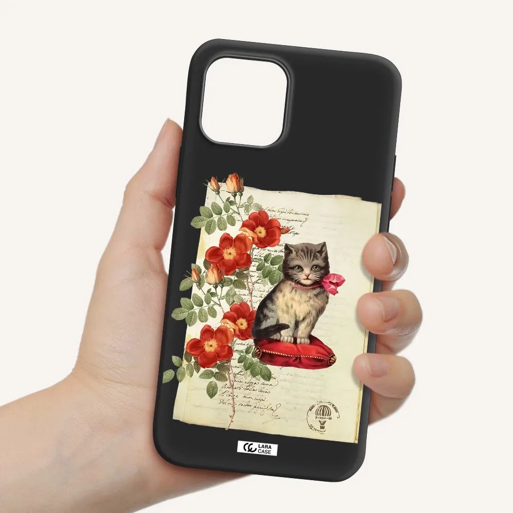 a cat on a pillow with flowers Apple iPhone 12 Silicone black Case