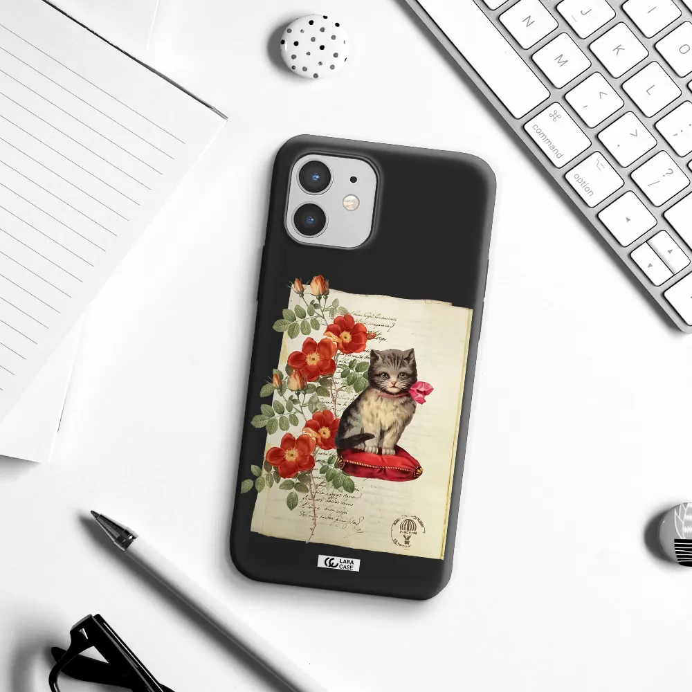 a cat on a pillow with flowers Apple iPhone 12 Silicone black Case