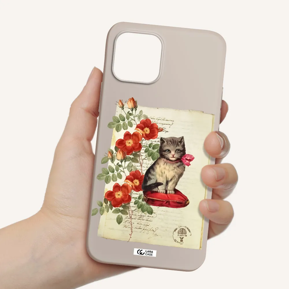 a cat on a pillow with flowers Apple iPhone 12 Silicone Stone Case