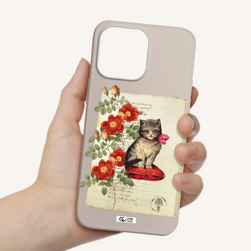 a cat on a pillow with flowers Apple iPhone 14 pro Silicone Stone Case