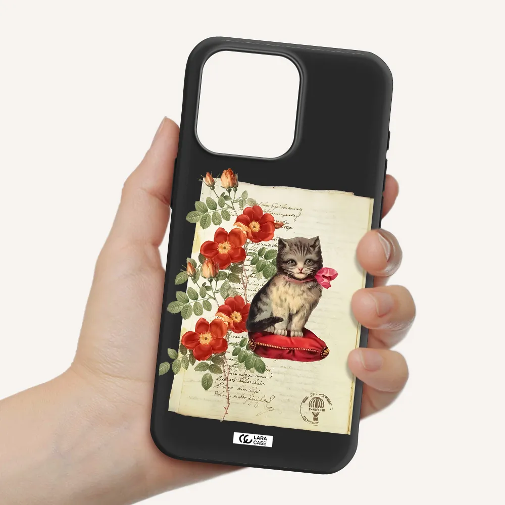 a cat on a pillow with flowers Apple Iphone 15 Pro max Silicone black Case