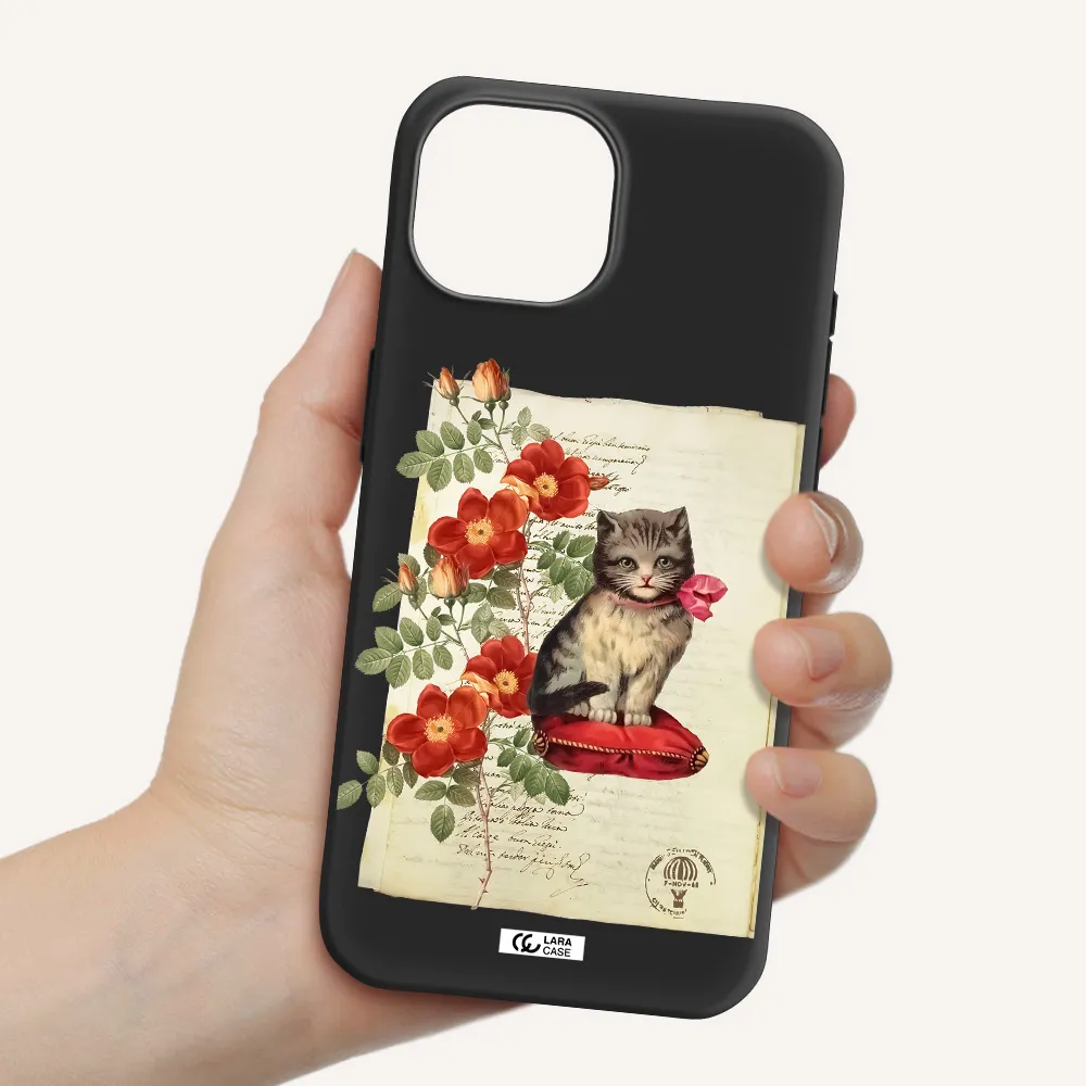 a cat on a pillow with flowers Apple iPhone 15 Silicone black Case