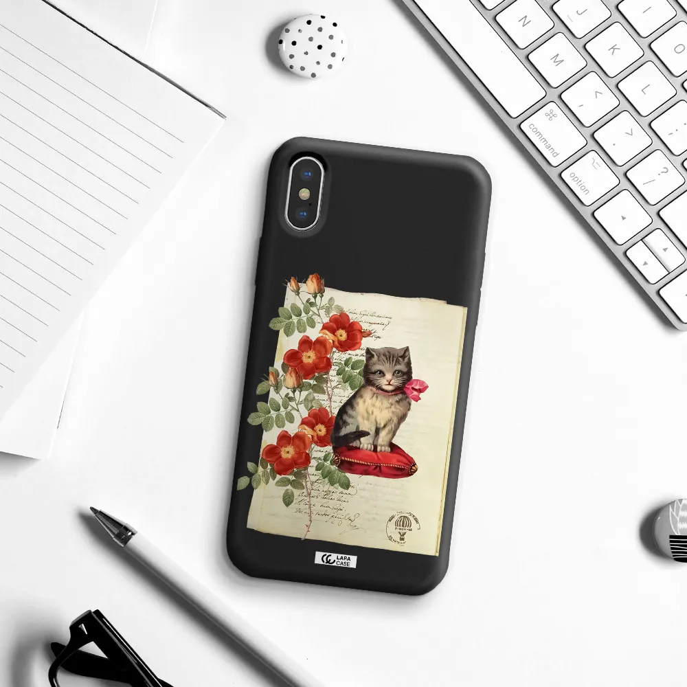 a cat on a pillow with flowers Apple iPhone XS Silicone black Case