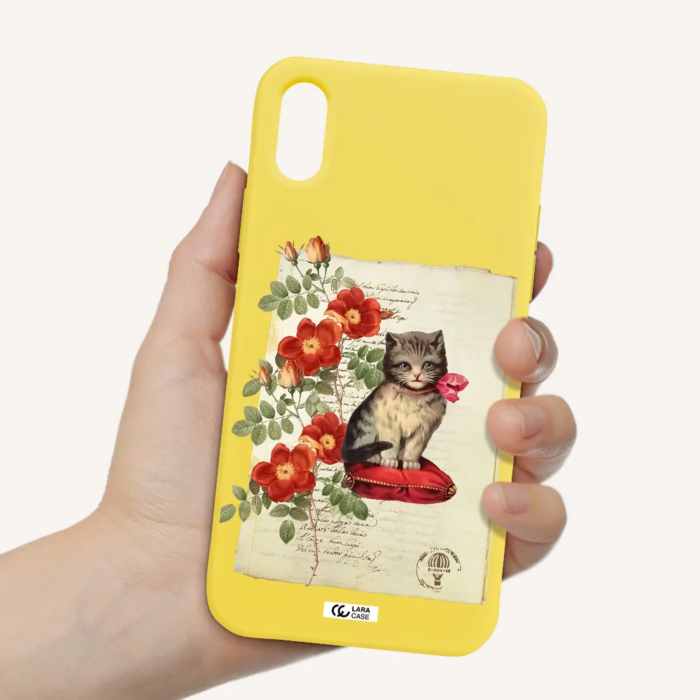 a cat on a pillow with flowers Apple iPhone XS Silicone canary yellow Case