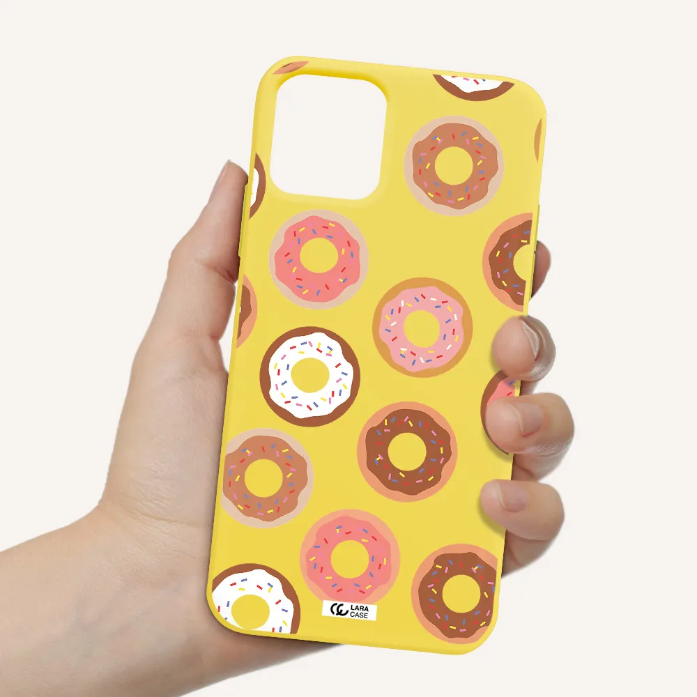 a pattern of donuts with sprinkles Apple iPhone 11 pro max Silicone canary yellow Case