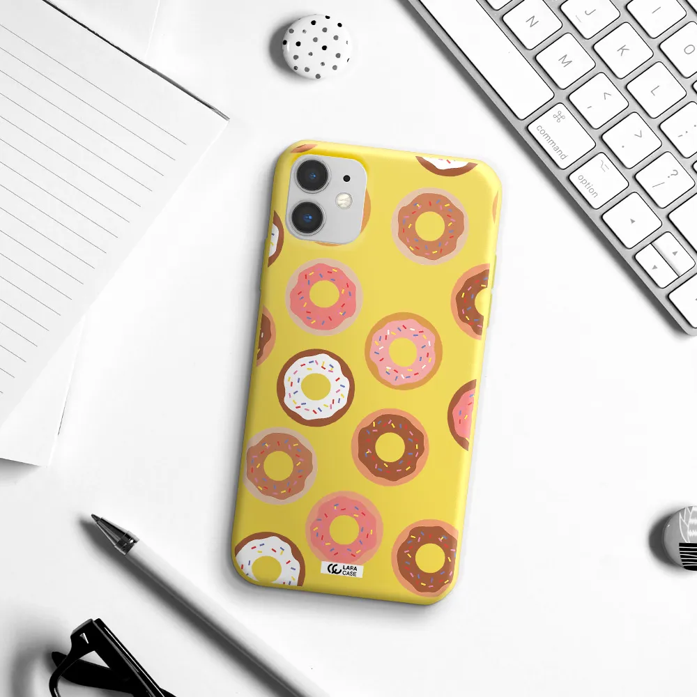 a pattern of donuts with sprinkles Apple iPhone 11 Silicone canary yellow Case