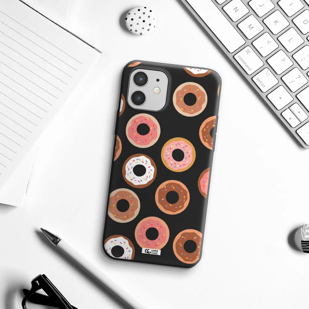 a pattern of donuts with sprinkles Apple iPhone 12 Silicone black Case