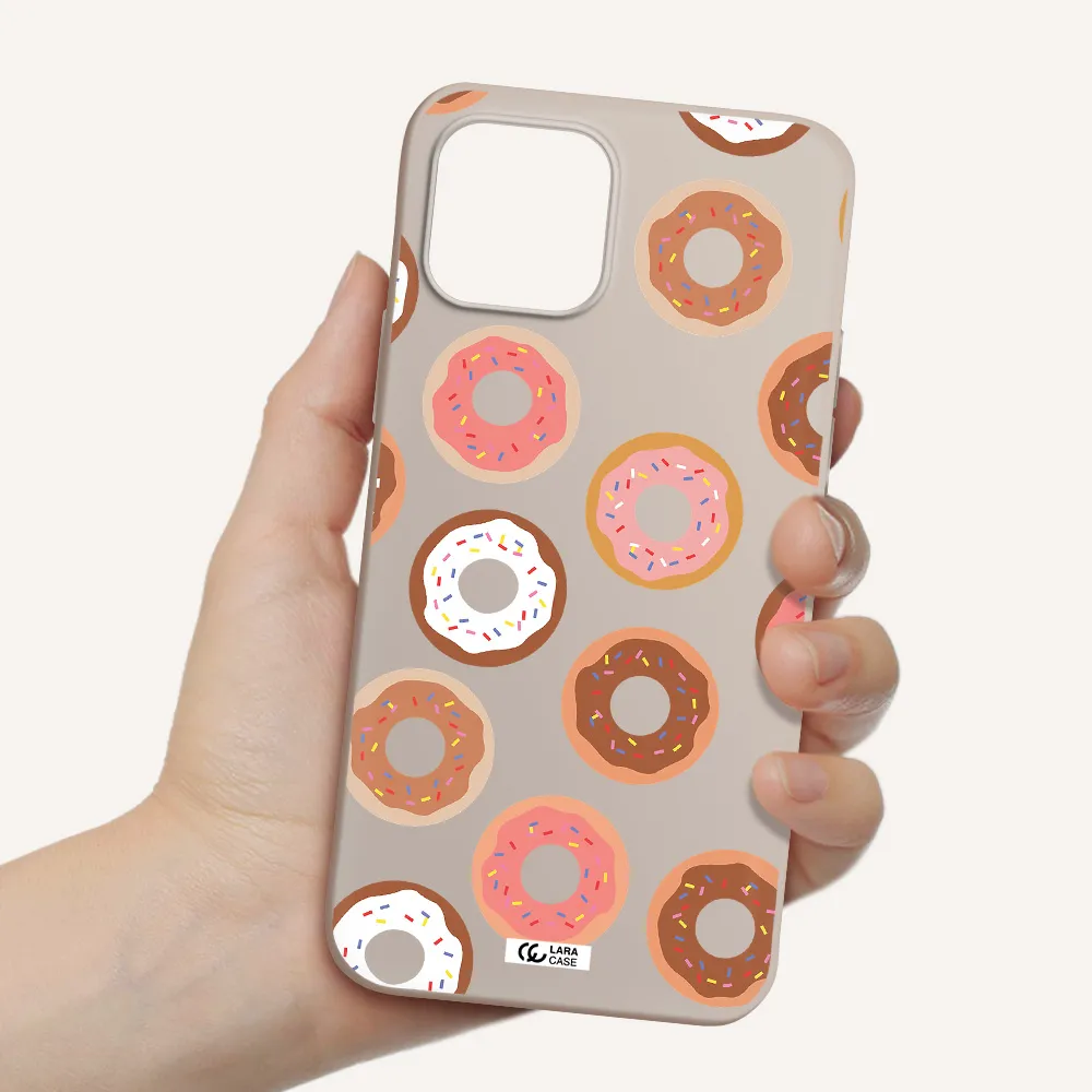 a pattern of donuts with sprinkles Apple iPhone 12 Silicone Stone Case