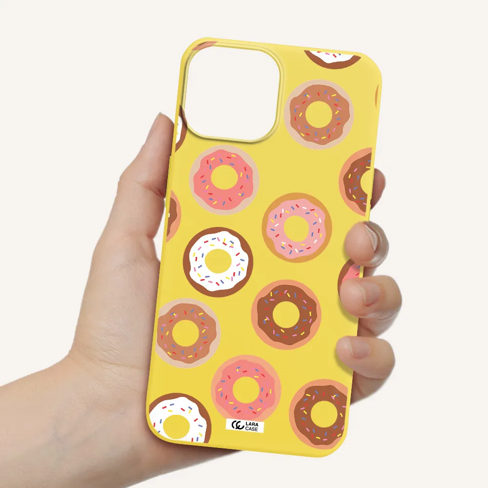 a pattern of donuts with sprinkles Apple iPhone 13 mini Silicone canary yellow Case
