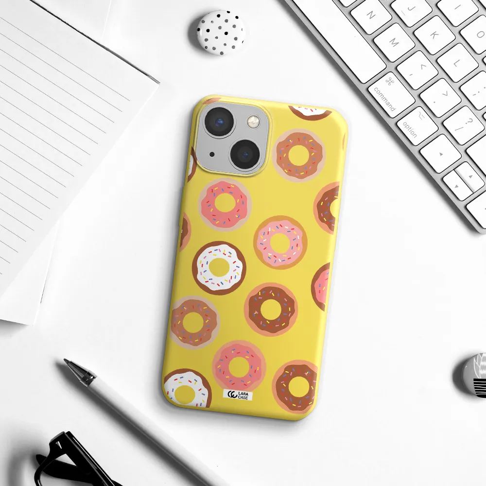 a pattern of donuts with sprinkles Apple iPhone 13 mini Silicone canary yellow Case