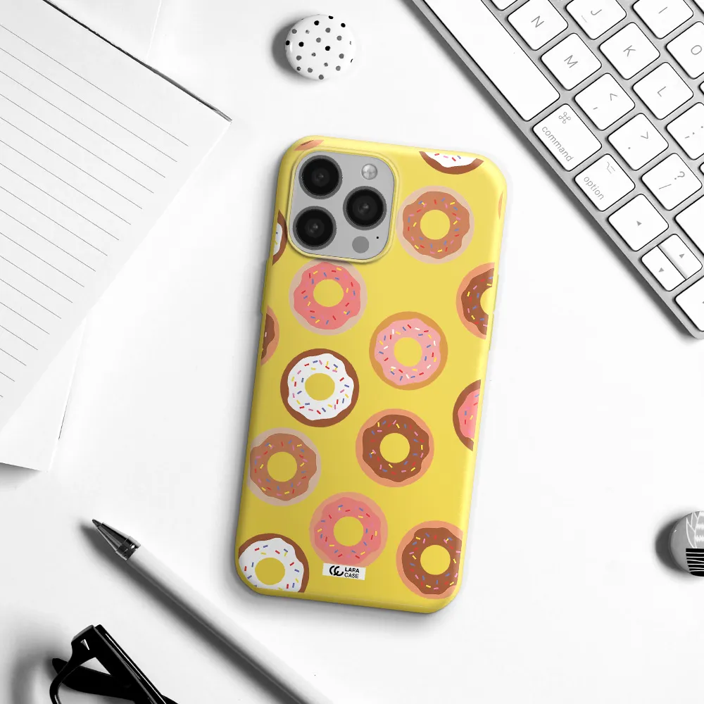 a pattern of donuts with sprinkles Apple iPhone 13 Pro Max Silicone canary yellow Case