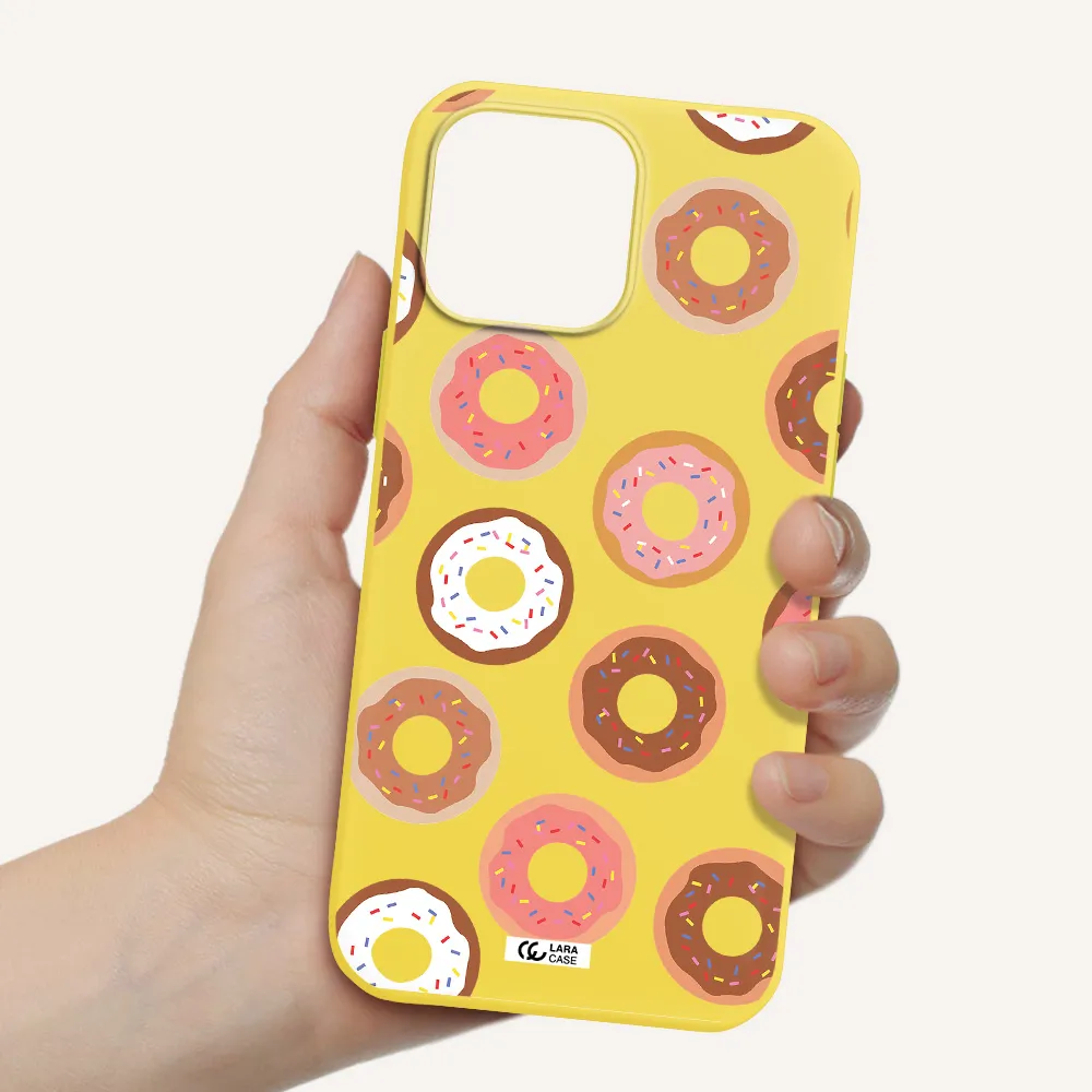 a pattern of donuts with sprinkles Apple iPhone 13 Pro Silicone canary yellow Case