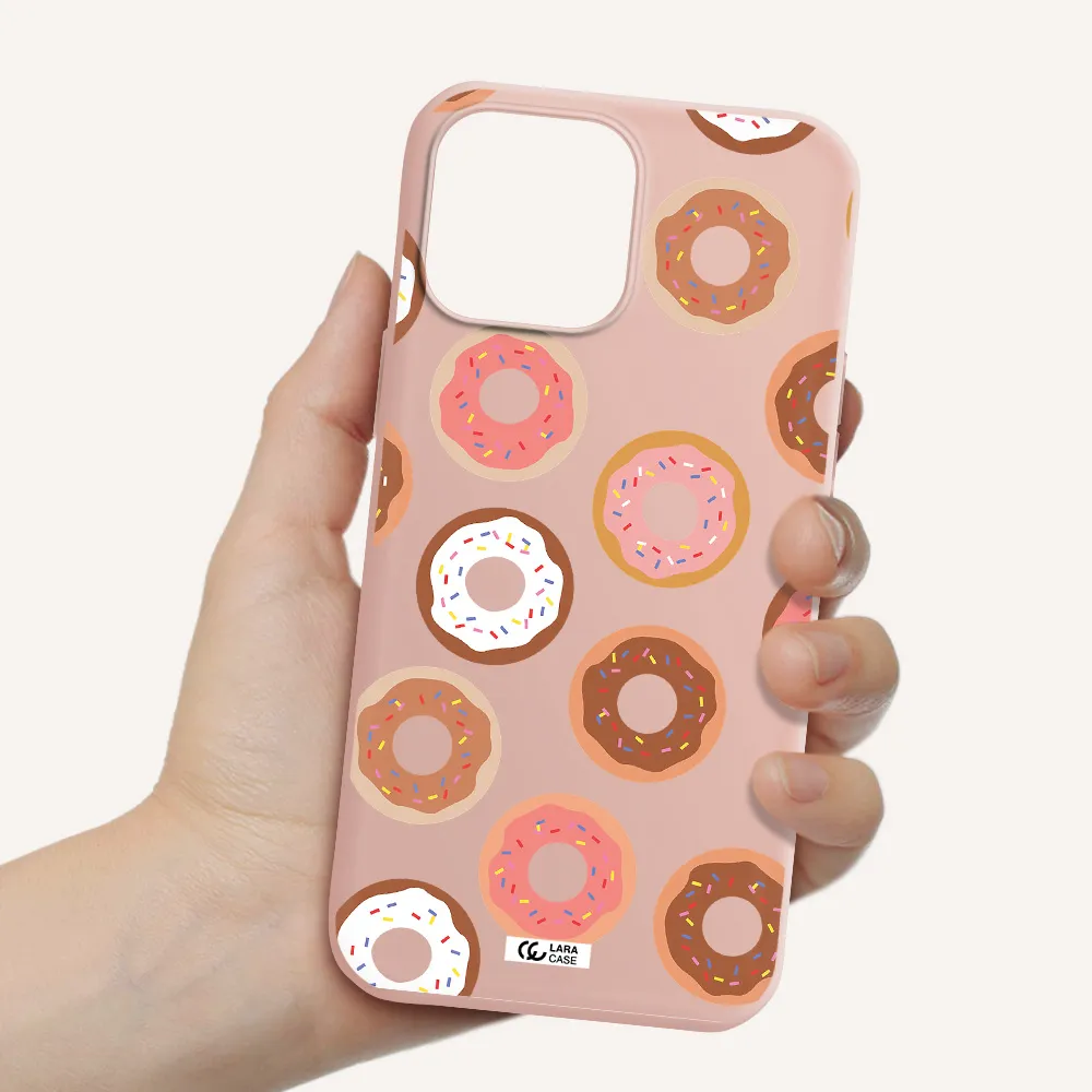 a pattern of donuts with sprinkles Apple iPhone 13 Pro Silicone pastel pink Case