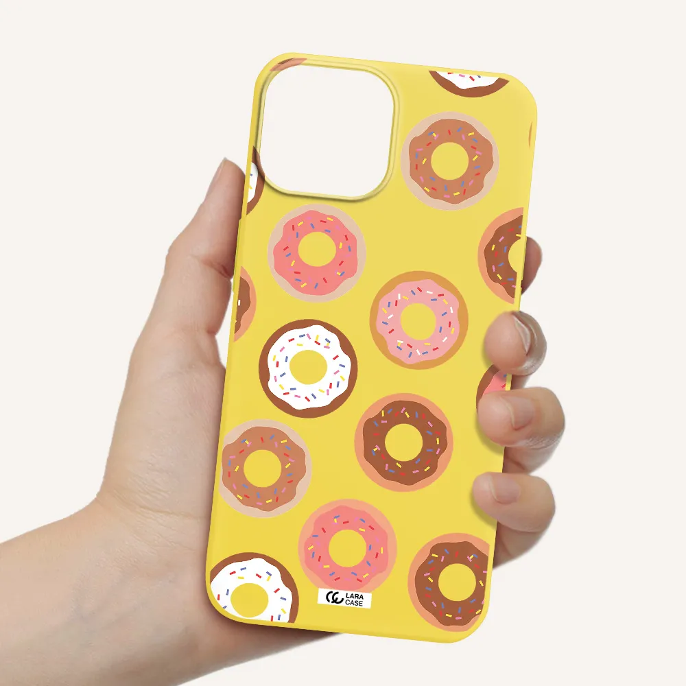 a pattern of donuts with sprinkles Apple iPhone 13 Silicone canary yellow Case
