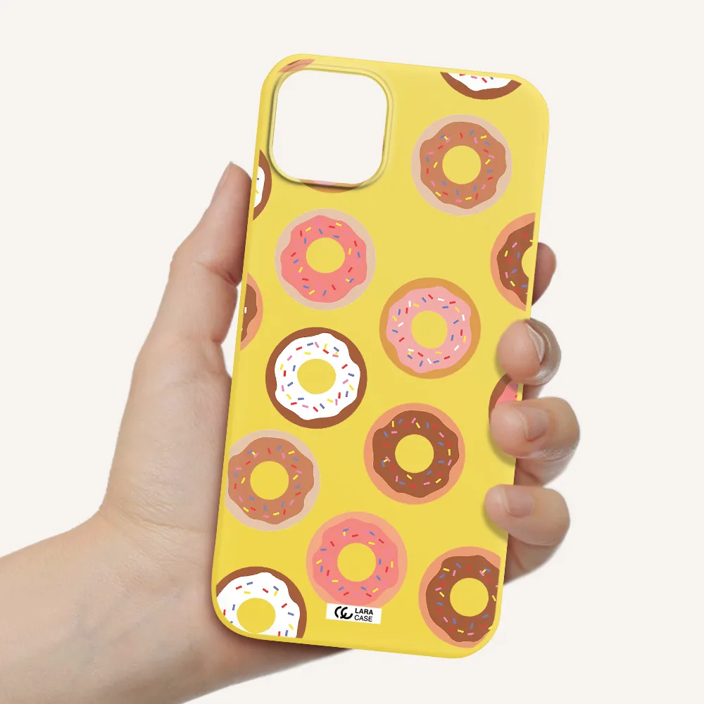a pattern of donuts with sprinkles Apple iPhone 14 plus Silicone canary yellow Case
