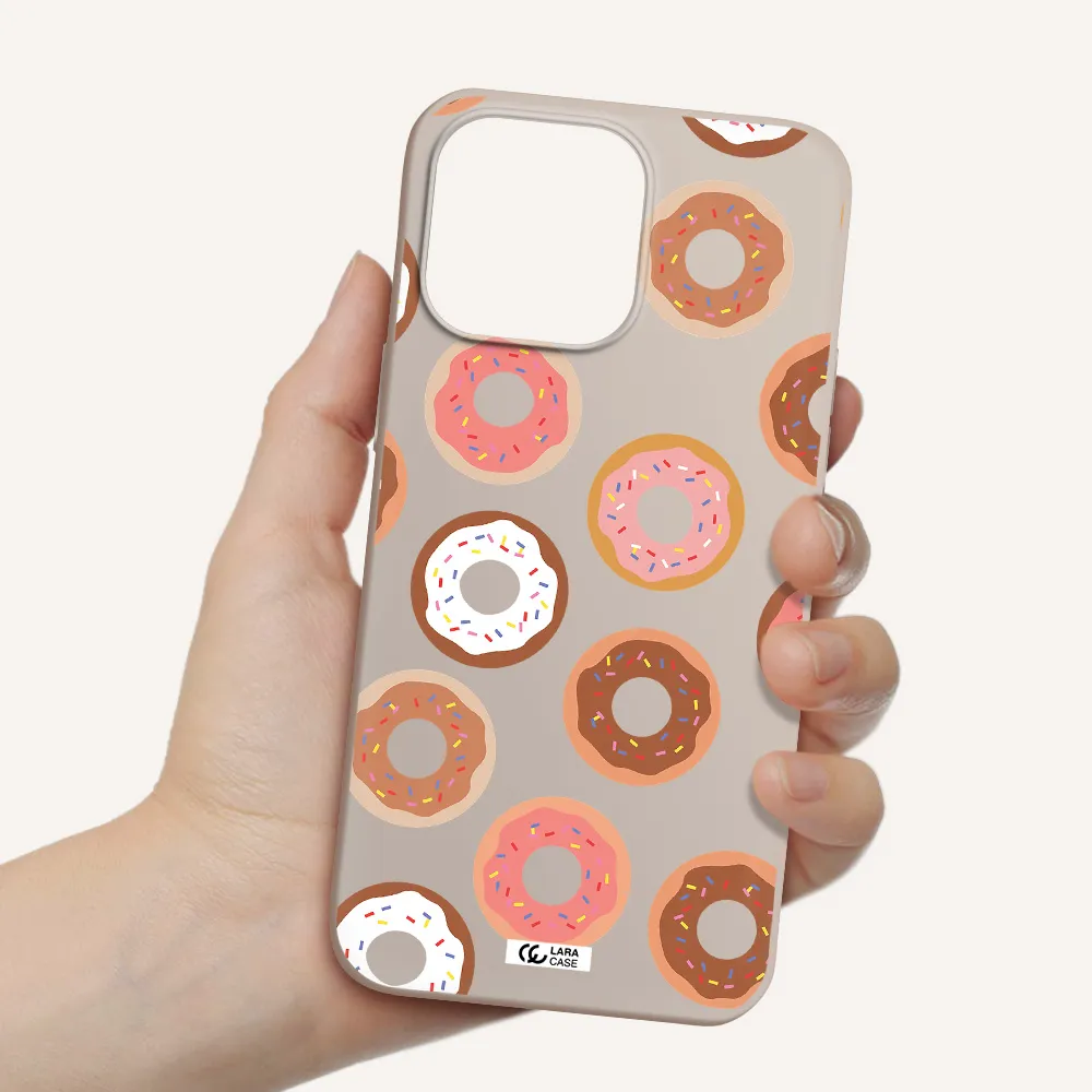 a pattern of donuts with sprinkles Apple iPhone 14 pro max Silicone Stone Case