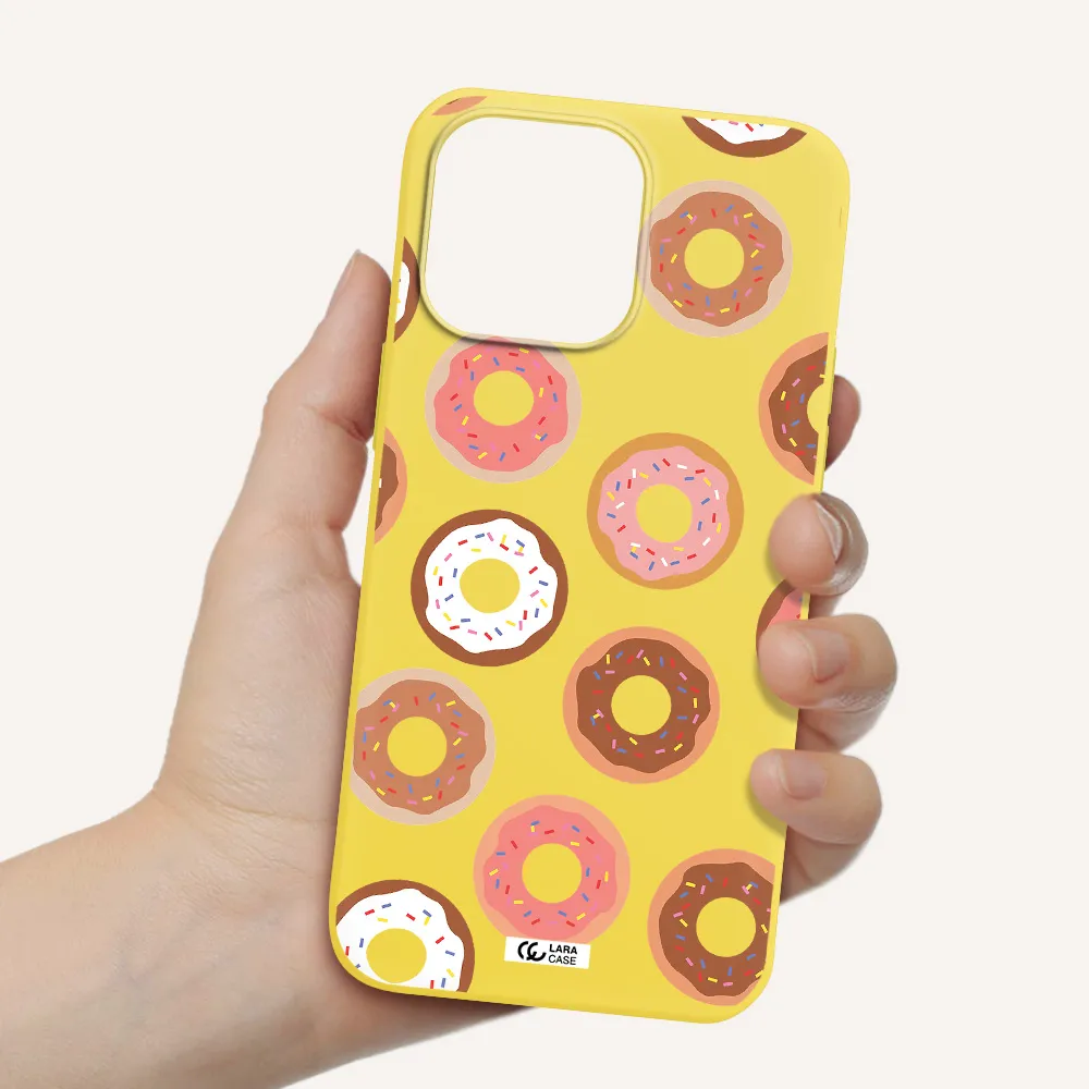 a pattern of donuts with sprinkles Apple iPhone 14 pro Silicone canary yellow Case