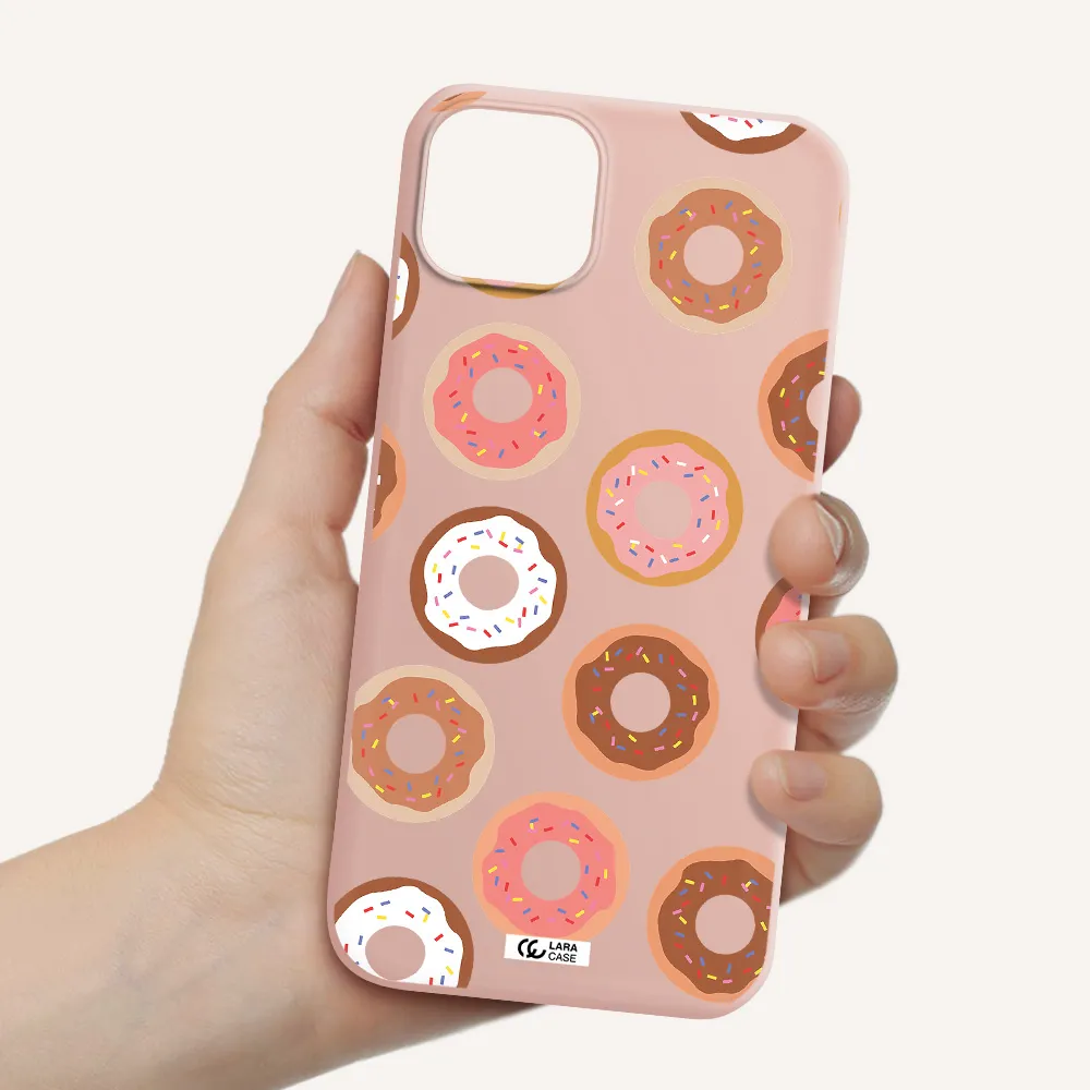 a pattern of donuts with sprinkles Apple iPhone 14 Silicone pastel pink Case