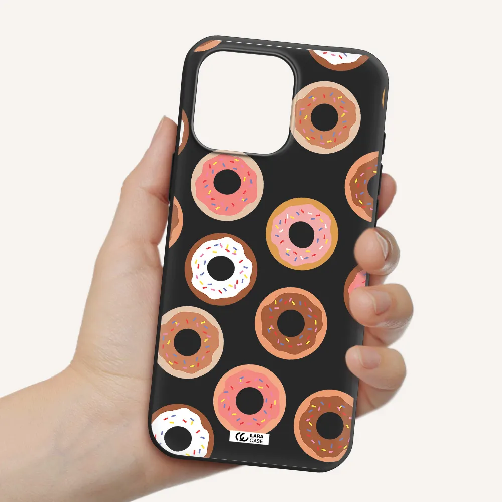 A Pattern Of Donuts With Sprinkles Apple Iphone 16 Pro Max Silicone Black Case