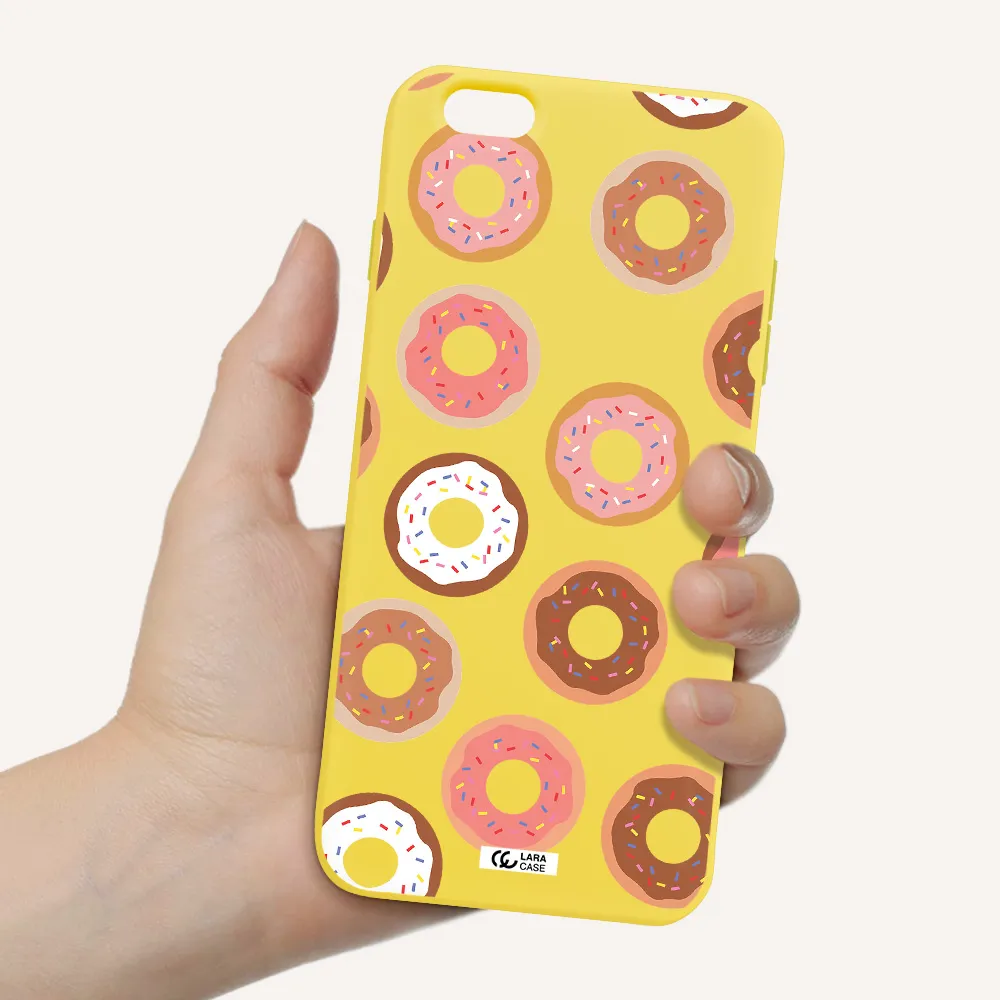 a pattern of donuts with sprinkles Apple iPhone 6S Silicone canary yellow Case