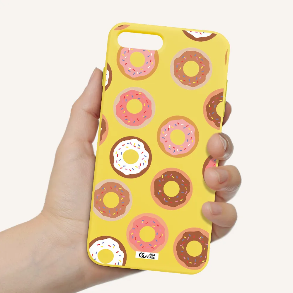 a pattern of donuts with sprinkles Apple iPhone 7 plus Silicone canary yellow Case