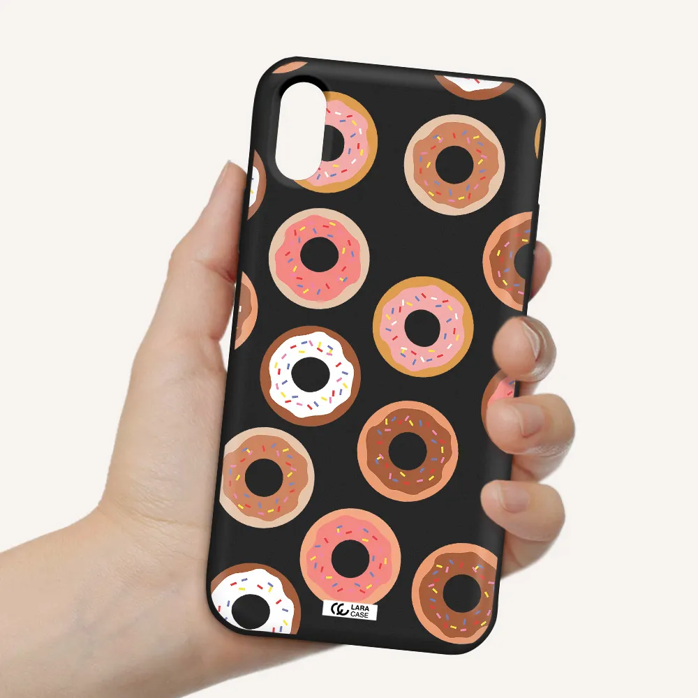 a pattern of donuts with sprinkles Apple iPhone X Silicone black Case