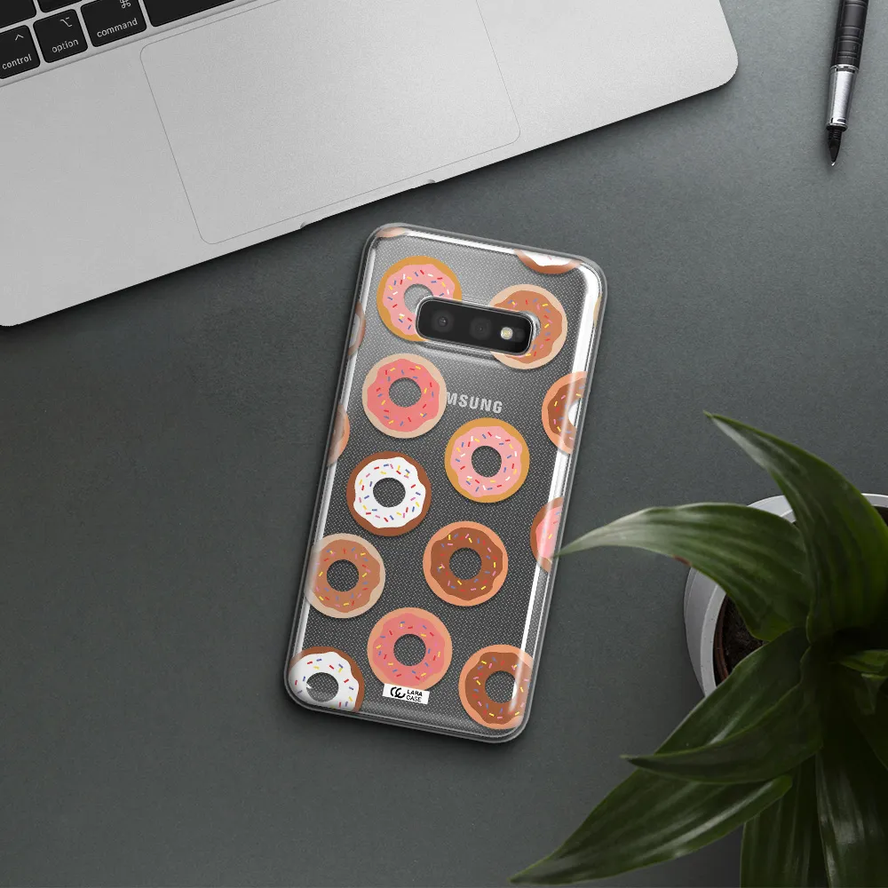 a pattern of donuts with sprinkles Samsung S10e Clear TPU Case