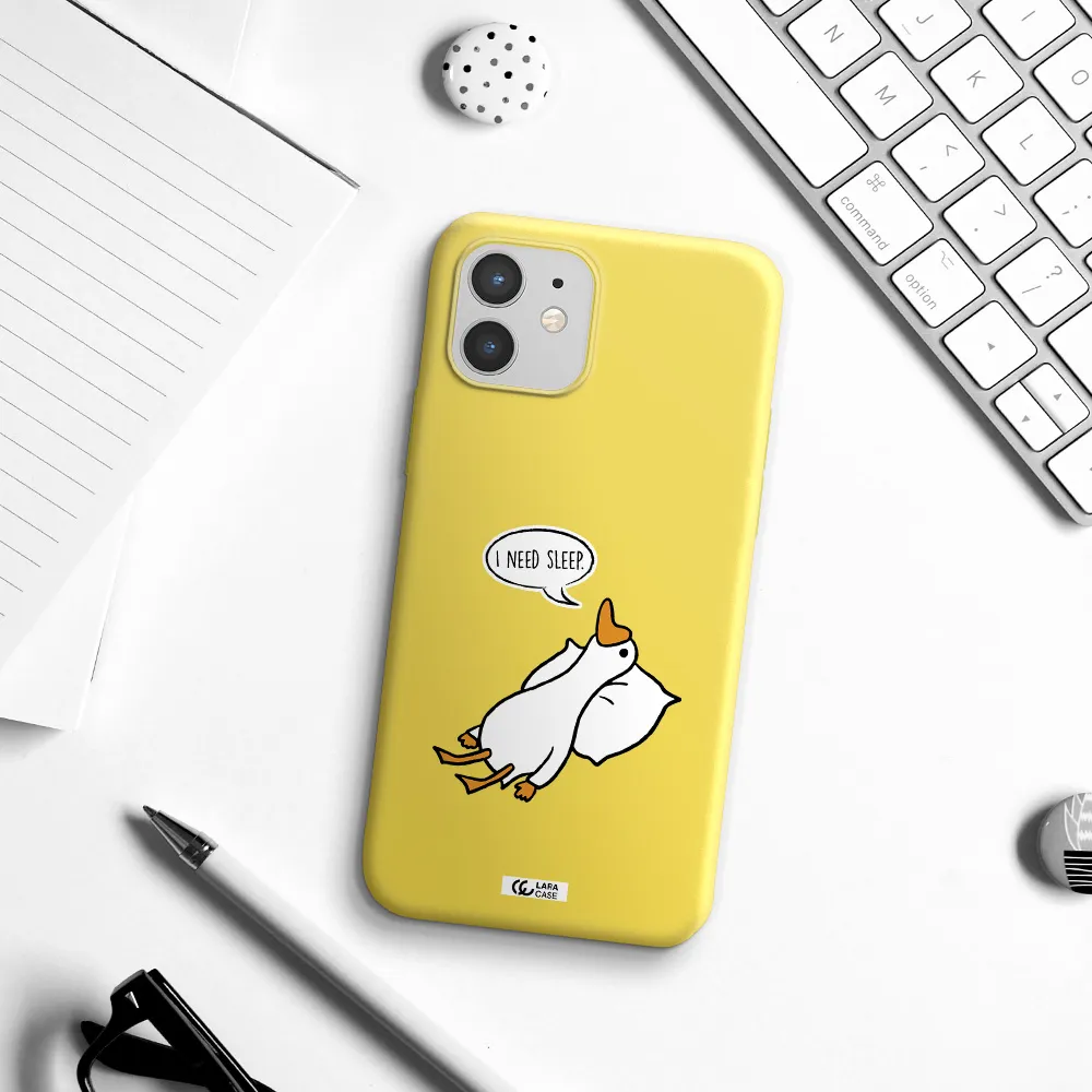 a cartoon of a duck with a pillow Apple iPhone 12 Silicone canary yellow Case