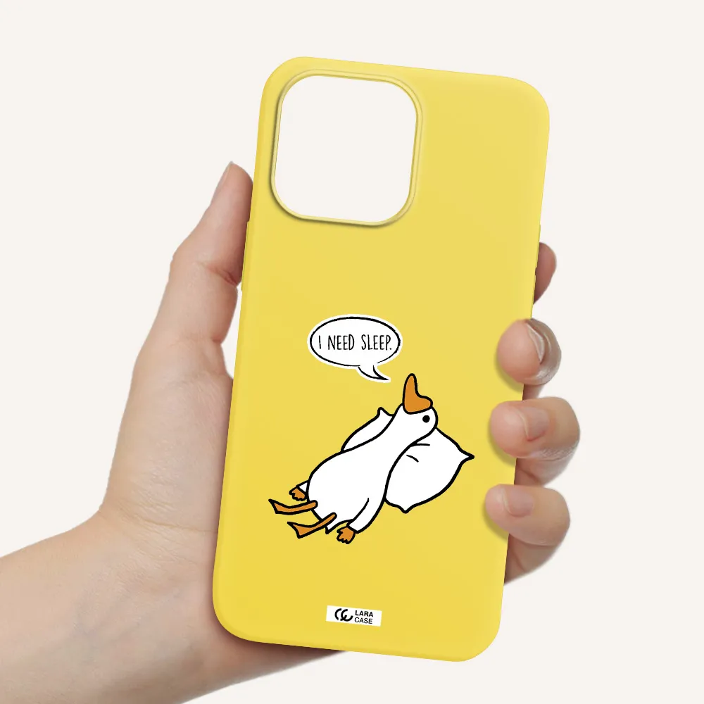 a cartoon of a duck with a pillow Apple iPhone 14 pro Silicone canary yellow Case