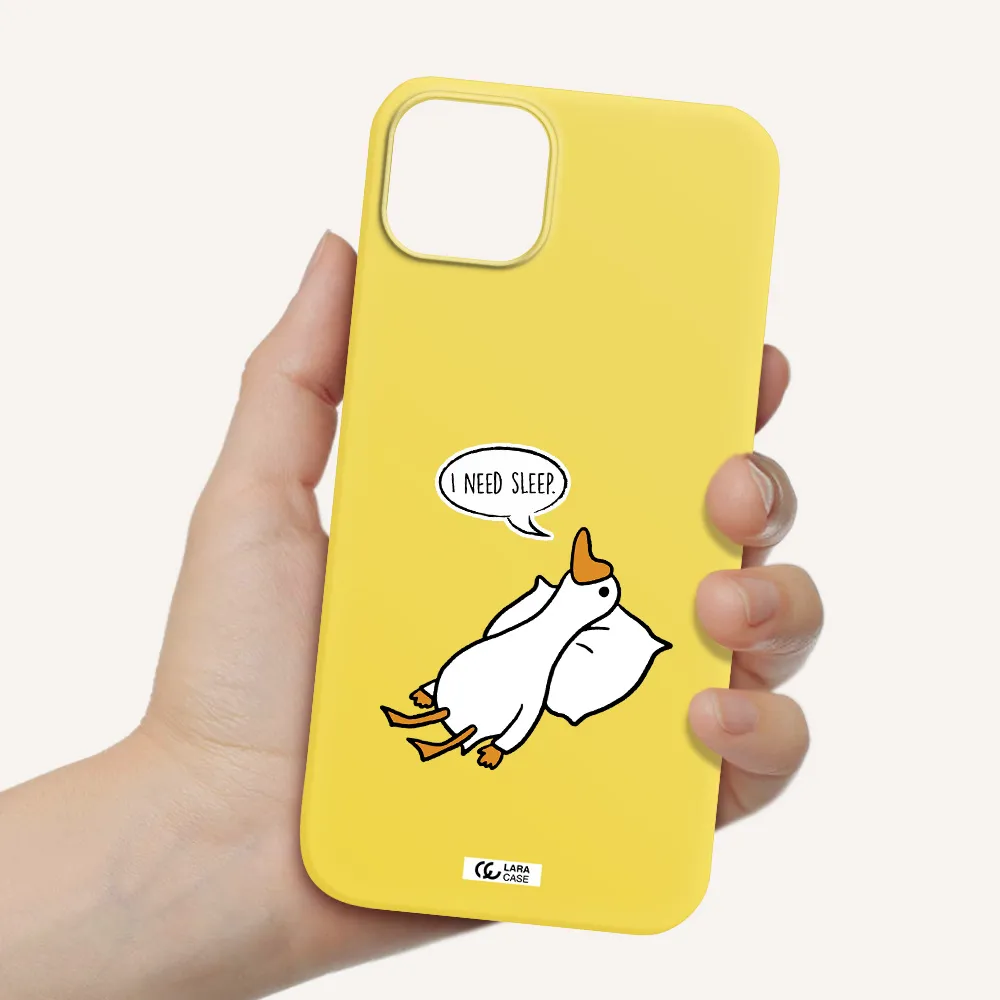 a cartoon of a duck with a pillow Apple iPhone 14 Silicone canary yellow Case