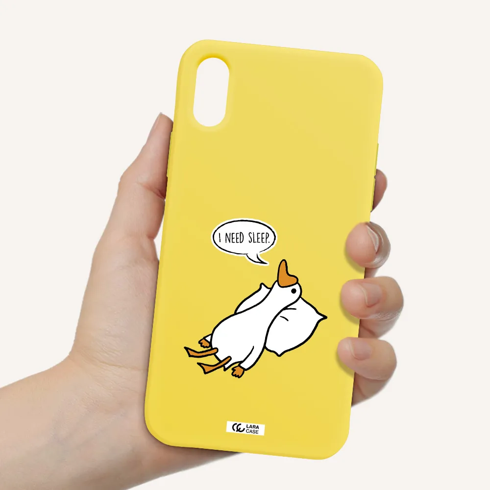 a cartoon of a duck with a pillow Apple iPhone XS Silicone canary yellow Case