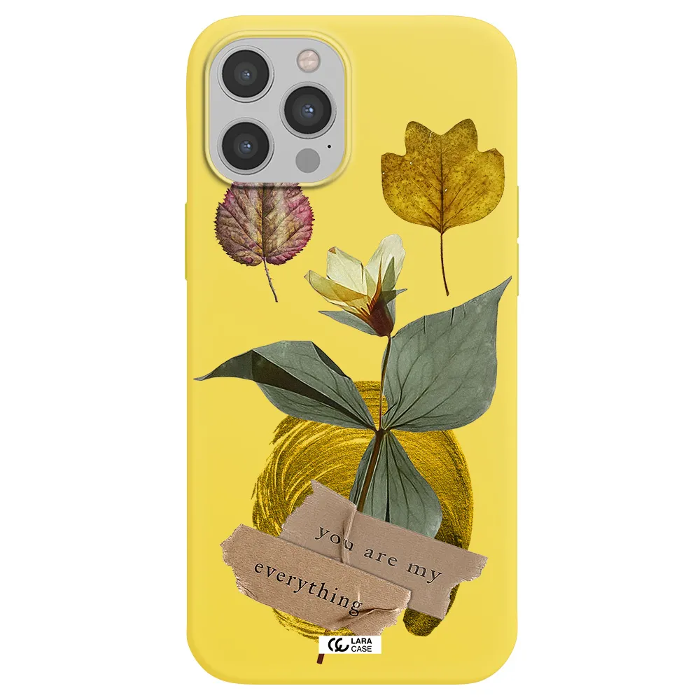 a flower with leaves and a box Apple iPhone 12 pro Silicone canary yellow Case