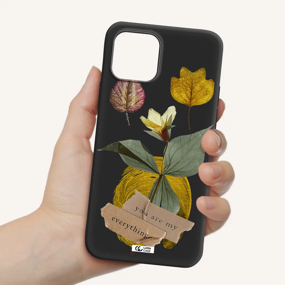 a flower with leaves and a box Apple iPhone 12 Silicone black Case