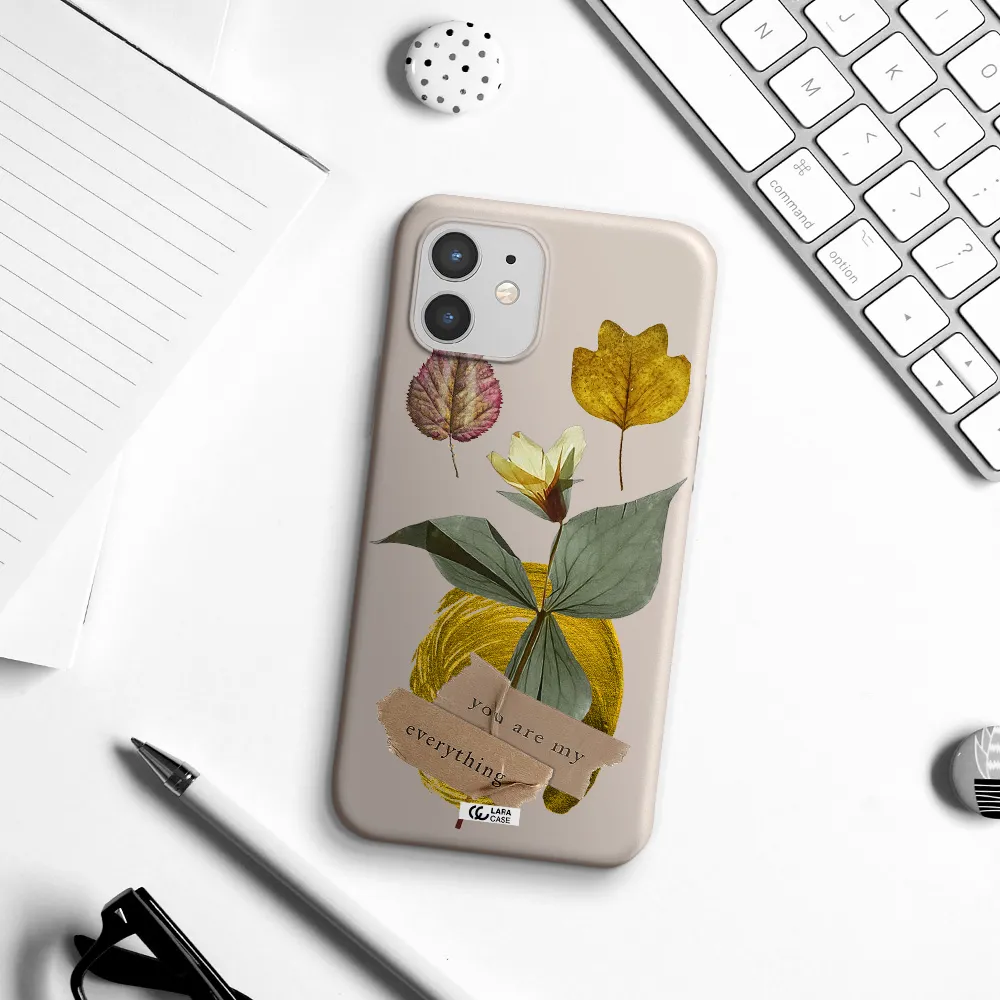 a flower with leaves and a box Apple iPhone 12 Silicone Stone Case