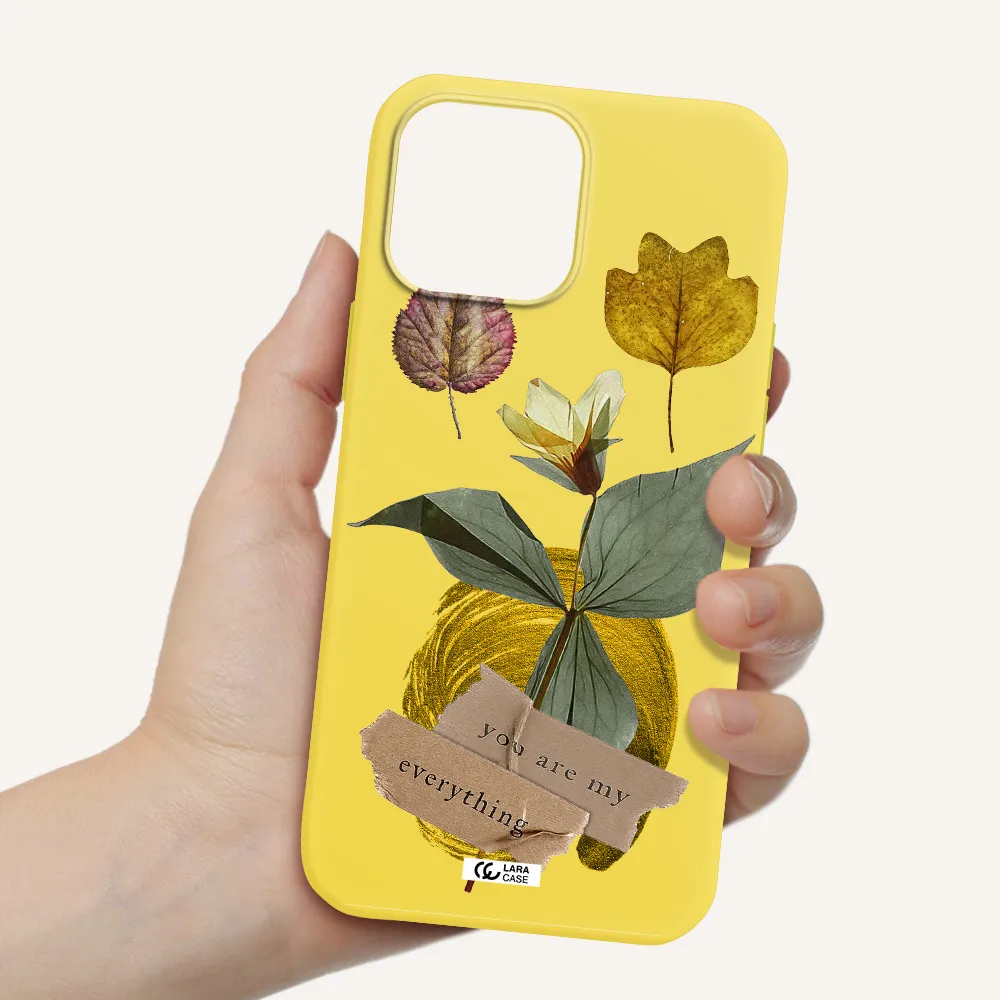 a flower with leaves and a box Apple iPhone 13 Pro Silicone canary yellow Case