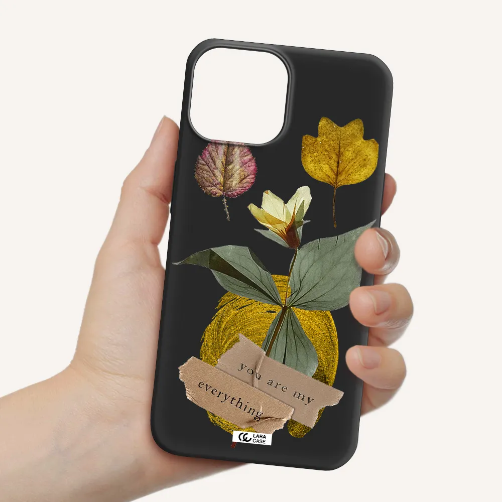 a flower with leaves and a box Apple iPhone 13 Silicone black Case