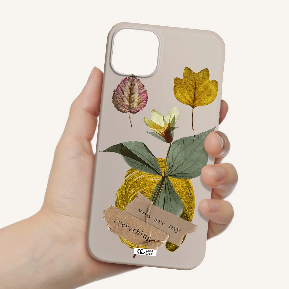 a flower with leaves and a box Apple iPhone 14 plus Silicone Stone Case