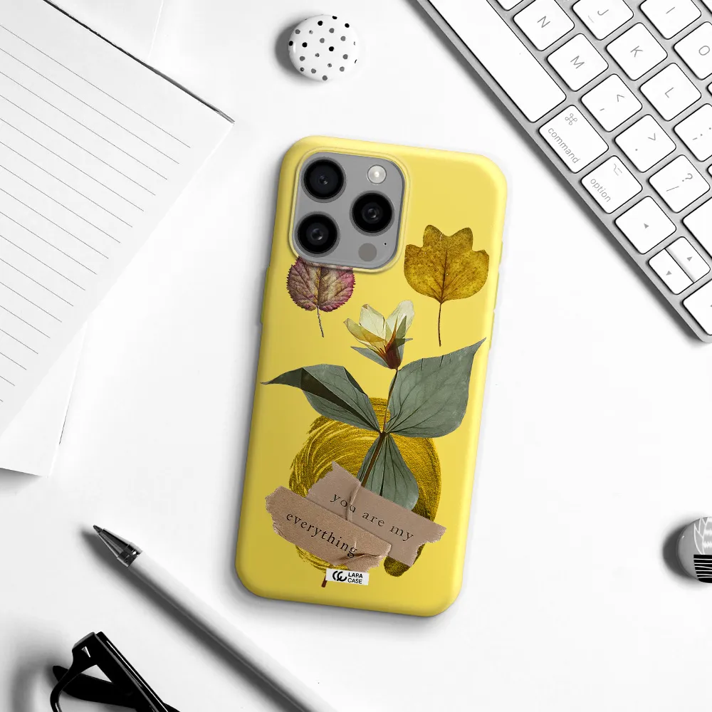 a flower with leaves and a box Apple Iphone 15 Pro max Silicone canary yellow Case