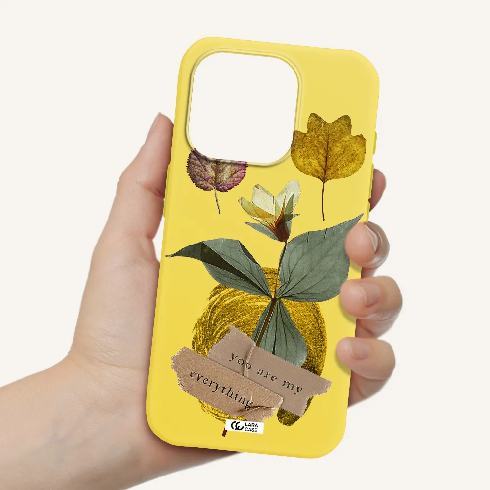 A Flower With Leaves And A Box Apple Iphone 15 Pro Silicone Canary Yellow Case