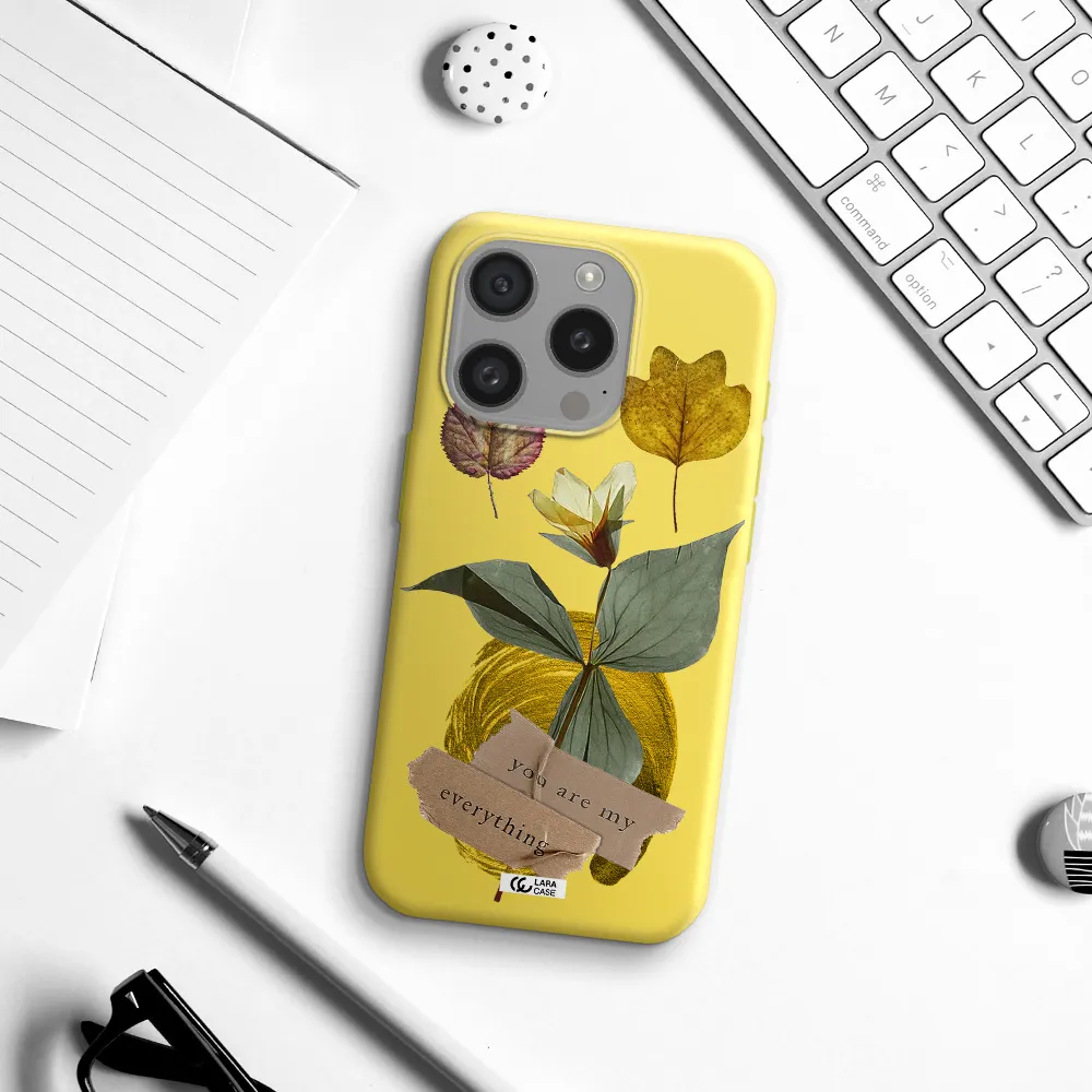 A Flower With Leaves And A Box Apple Iphone 15 Pro Silicone Canary Yellow Case