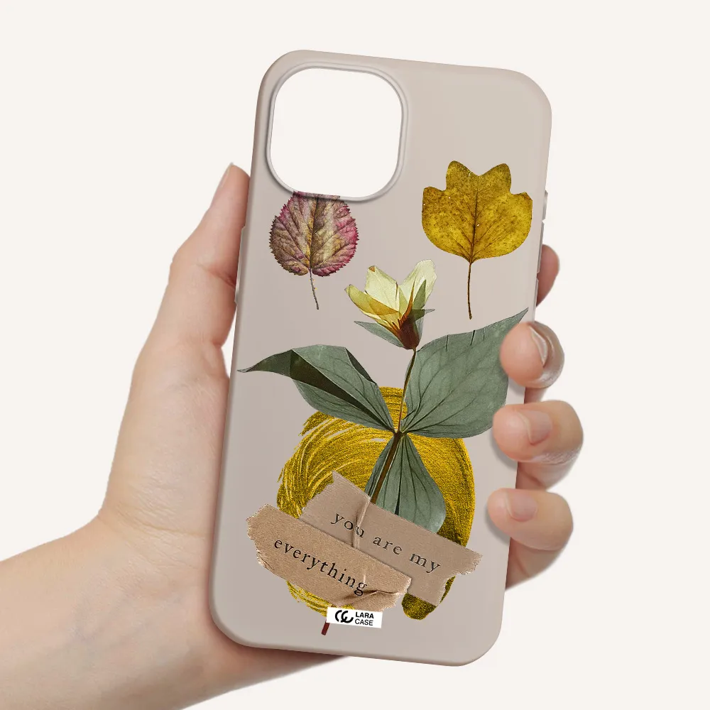 a flower with leaves and a box Apple iPhone 15 Silicone Stone Case