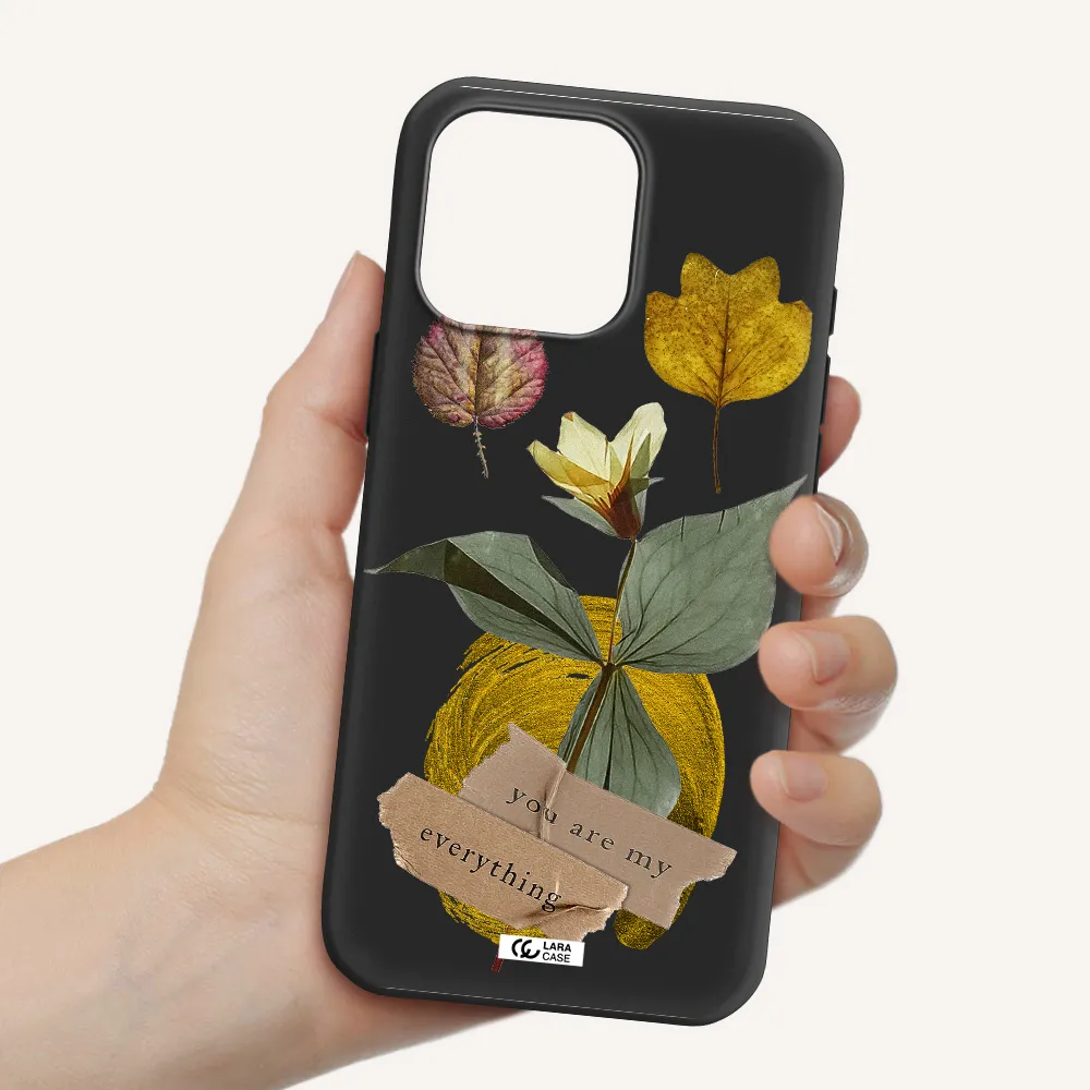 A Flower With Leaves And A Box Apple Iphone 16 Pro Max Silicone Black Case