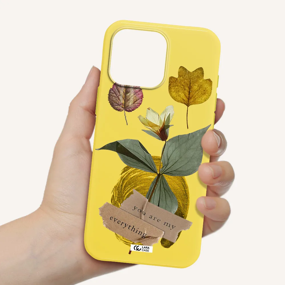 A Flower With Leaves And A Box Apple Iphone 16 Pro Max Silicone Canary Yellow Case