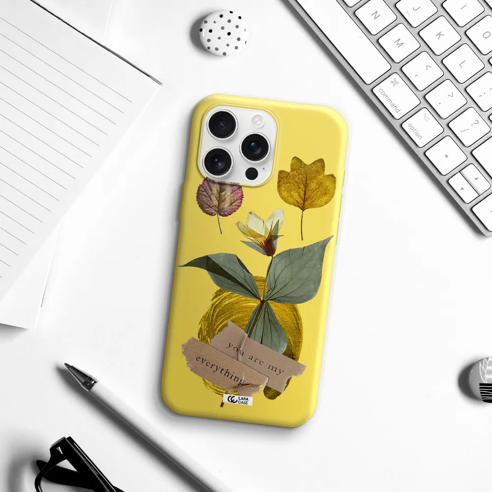 A Flower With Leaves And A Box Apple Iphone 16 Pro Max Silicone Canary Yellow Case