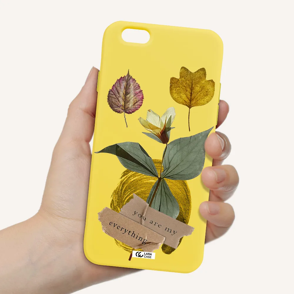 a flower with leaves and a box Apple iPhone 6 Silicone canary yellow Case