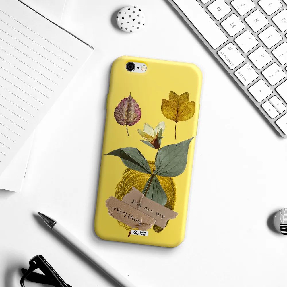 a flower with leaves and a box Apple iPhone 6 Silicone canary yellow Case