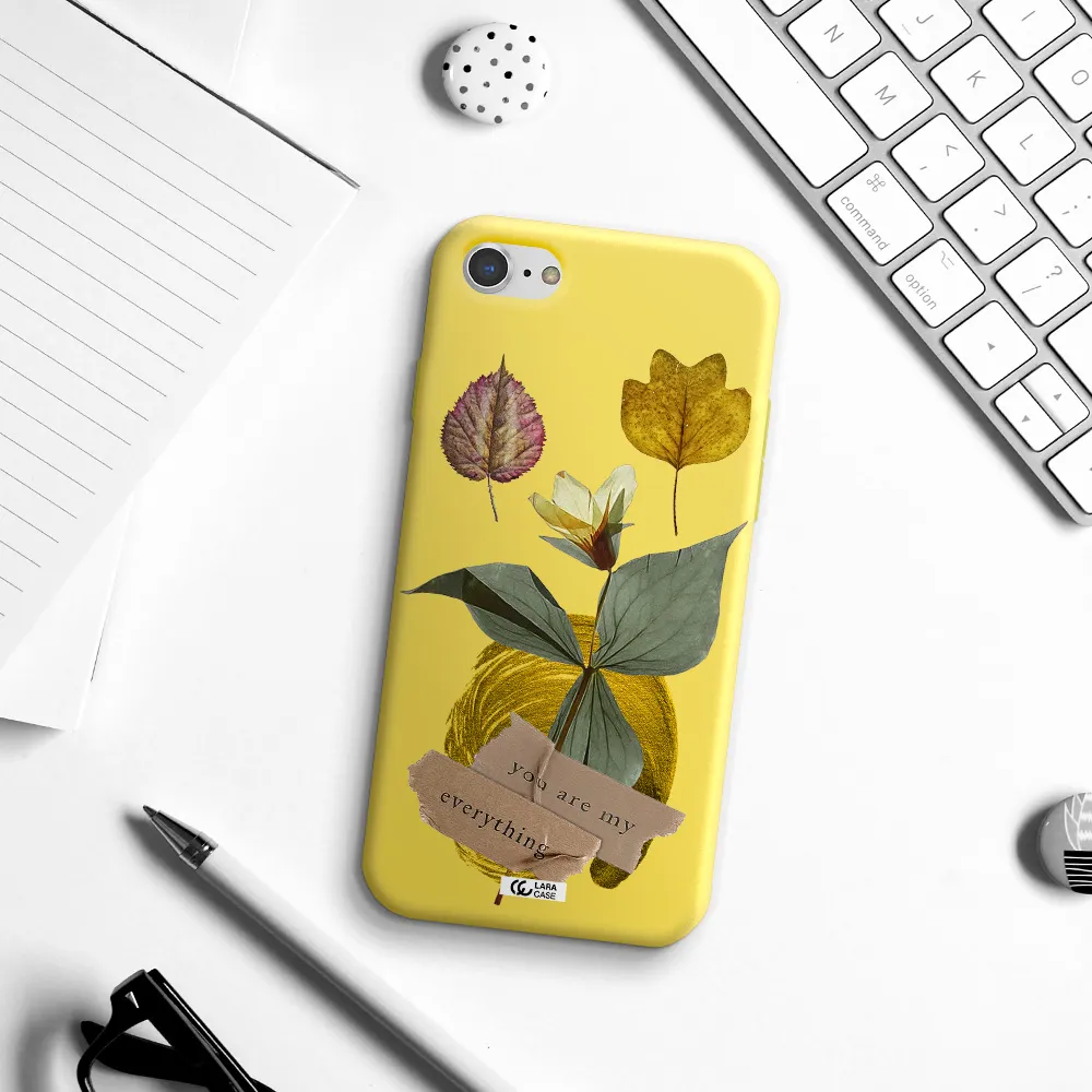 a flower with leaves and a box Apple iPhone 7 Silicone canary yellow Case
