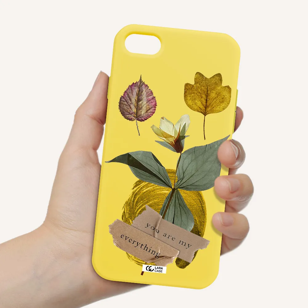 a flower with leaves and a box Apple iPhone 8 Silicone canary yellow Case