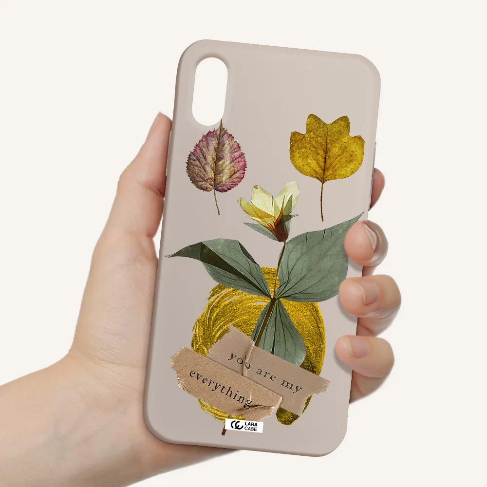 a flower with leaves and a box Apple iPhone XS Silicone Stone Case